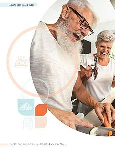 senior man and woman cooking in their kitchen laughing together